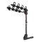 CURT hitch-mounted bike rack with adjustable arms and black powder coat finish, accommodating 2 to 4 bikes securely.