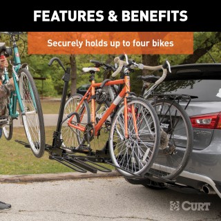 CURT Tray-Style Hitch-Mounted Bike Rack for Secure Transport CURT tray-style bike rack with hitch-mount, holding four bikes securely.