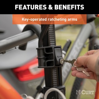 CURT Tray-Style Hitch-Mounted Bike Rack for Secure Transport CURT tray-style bike rack with hitch-mount, holding four bikes securely.