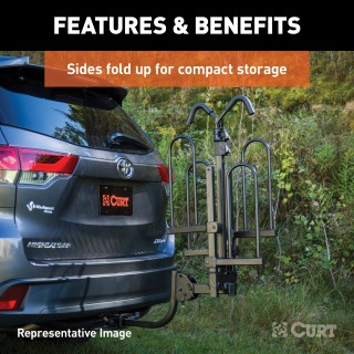 CURT Tray-Style Hitch-Mounted Bike Rack for Secure Transport CURT tray-style bike rack with hitch-mount, holding four bikes securely.