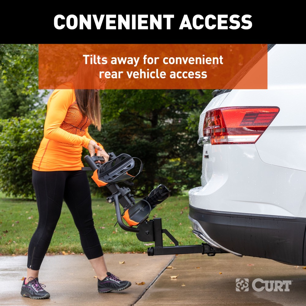 CURT Aluminum Bike Rack - Lightweight & Secure Platform Design CURT aluminum bike rack #18088 mounted on vehicle, holds two bikes securely.