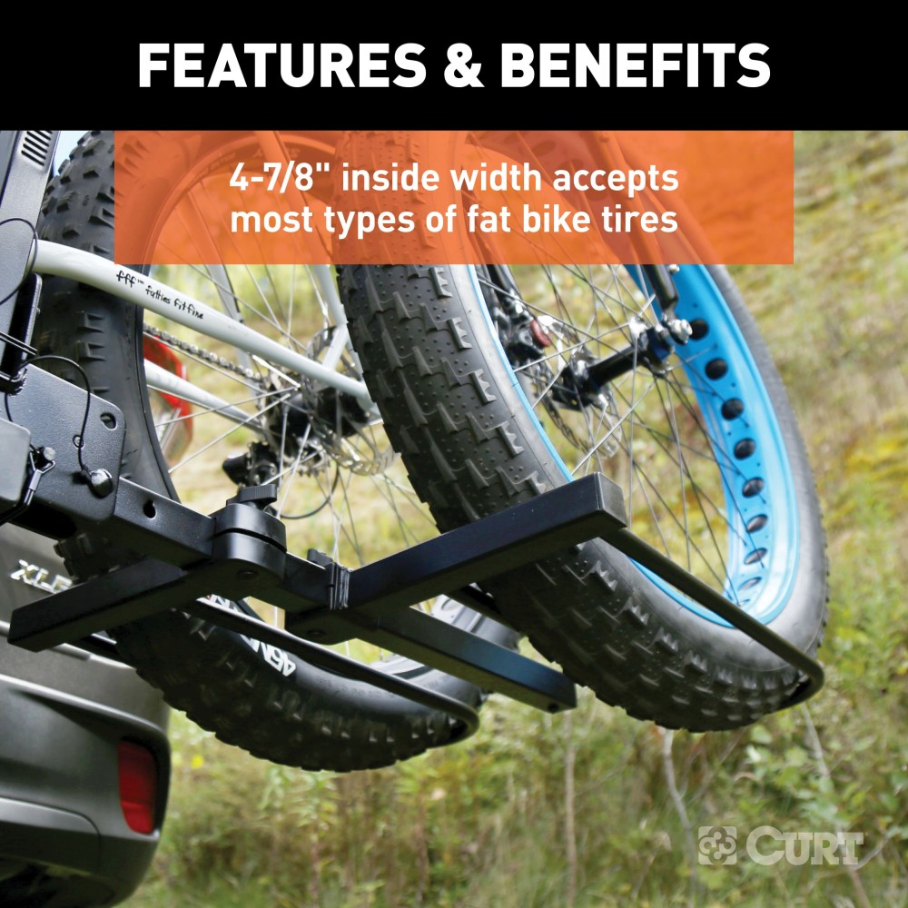 CURT tray-style bike rack with adjustable cradles for various bike sizes