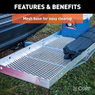 CURT Aluminum Hitch-Mounted Folding Cargo Carrier 500 lbs Capacity CURT tray-style hitch-mounted cargo carrier with aluminum design, folding feature, and 500 lbs capacity mounted on a vehicle.
