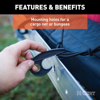 CURT Aluminum Hitch-Mounted Folding Cargo Carrier 500 lbs Capacity CURT tray-style hitch-mounted cargo carrier with aluminum design, folding feature, and 500 lbs capacity mounted on a vehicle.
