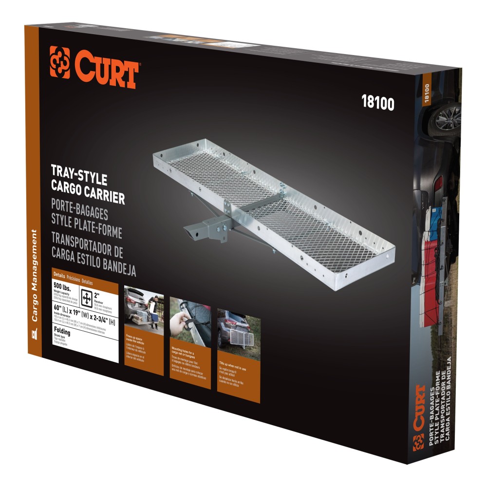 CURT Aluminum Hitch-Mounted Folding Cargo Carrier 500 lbs Capacity CURT tray-style hitch-mounted cargo carrier with aluminum design, folding feature, and 500 lbs capacity mounted on a vehicle.