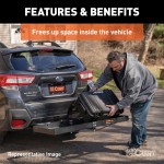 CURT trailer hitch cargo carrier, mesh tray-style, black powder coat, mounted on vehicle.