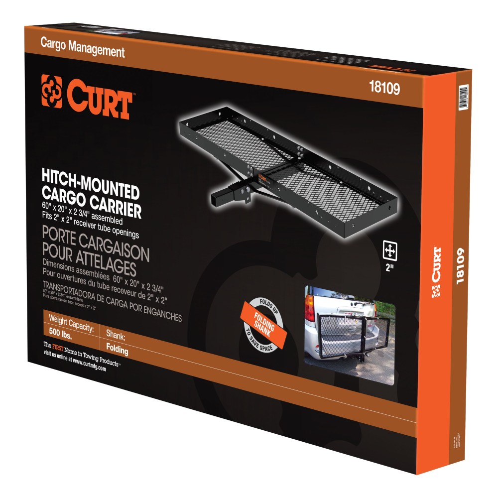 CURT trailer hitch cargo carrier, mesh tray-style, black powder coat, mounted on vehicle.