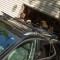 CURT Universal Roof Rack Cross Bars for Secure Cargo Storage CURT roof rack cross bars with black powder coat finish on car