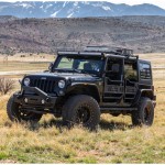 CURT Jeep Roof Rack Crossbars for Wrangler JL and Gladiator CURT Jeep roof rack crossbars mounted on a Jeep Wrangler JL or Gladiator, offering enhanced cargo storage.