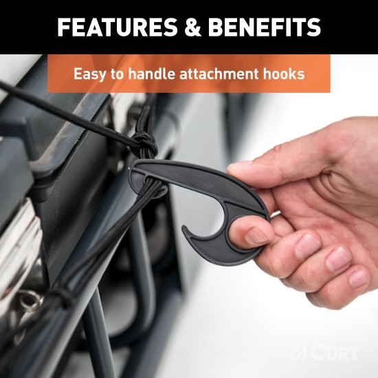 CURT cargo carrier net with hooks securing cargo on a roof rack, measuring 44 by 38 inches.