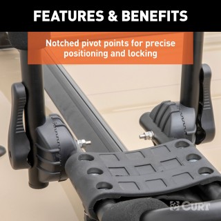 CURT Kayak Roof Rack with Rotating Arms and Foam Padding CURT kayak roof rack with adjustable arms and foam padding on vehicle roof