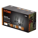 CURT Kayak Roof Rack with Rotating Arms and Foam Padding CURT kayak roof rack with adjustable arms and foam padding on vehicle roof