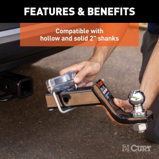 CURT Anti-Rattle Hitch Clamp for 2-Inch Receiver Hitches CURT anti-rattle hitch clamp installed on a 2-inch receiver hitch, preventing noise and vibration