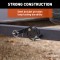 CURT HD Wheel Chocks with Mounting Bracket for Trailers CURT HD wheel chocks mounted on trailer frame with orange finish