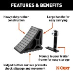CURT HD Wheel Chocks with Mounting Bracket for Easy Storage CURT HD wheel chocks with mounting bracket attached to trailer, shown in use.