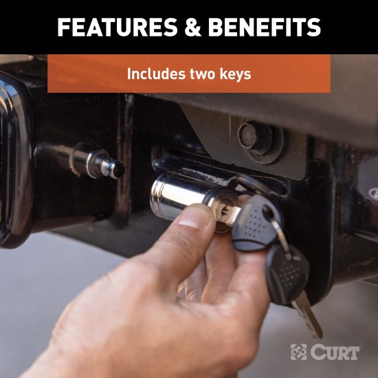 CURT Barbell Hitch Lock with Key - Fits 2 and 2-1/2 Inch Receivers CURT hitch lock with a chrome finish and barbell design, secured with a key