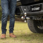 CURT Multi-Ball Mount with Tow Hook for Varied Trailer Sizes CURT multi-ball mount with three balls and tow hook for versatile towing