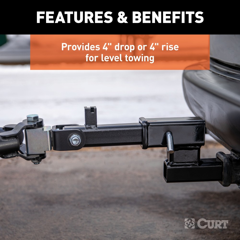 CURT hitch adapter for towing with 4-inch rise or drop, fits 2-inch receiver, black finish.