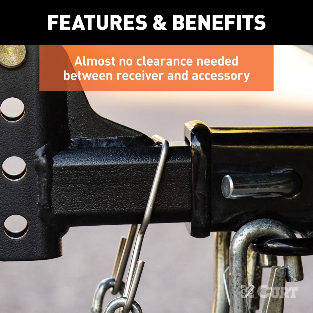 CURT Trailer Safety Chain Hanger Bracket on 2-Inch Hitch CURT safety chain hanger bracket clipped onto a 2-inch hitch shank, keeping trailer chains off the ground with durable steel construction.