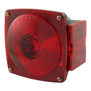 CURT passenger-side trailer light with red lenses and molded housing for towing