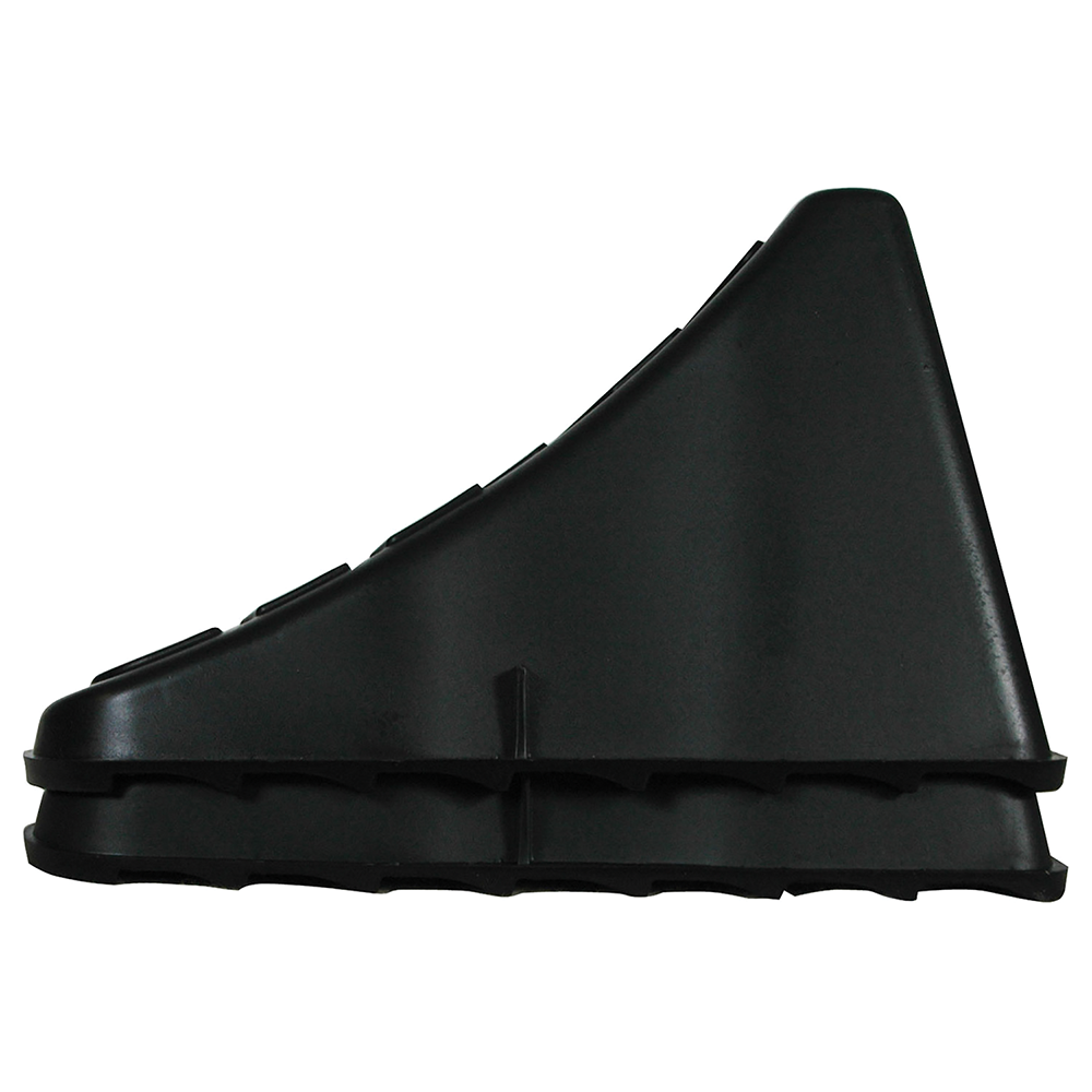 High Impact Polymer Trailer Wheel Chocks for Stability A pair of high impact polymer wheel chocks placed under trailer tires.