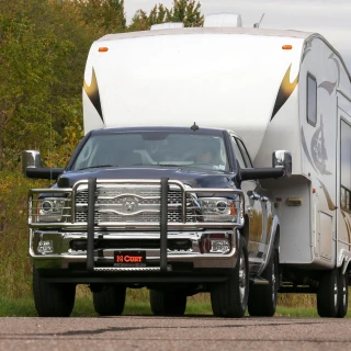 CURT adapter plate converting gooseneck hitch to 5th wheel rails, supports up to 20K lbs.