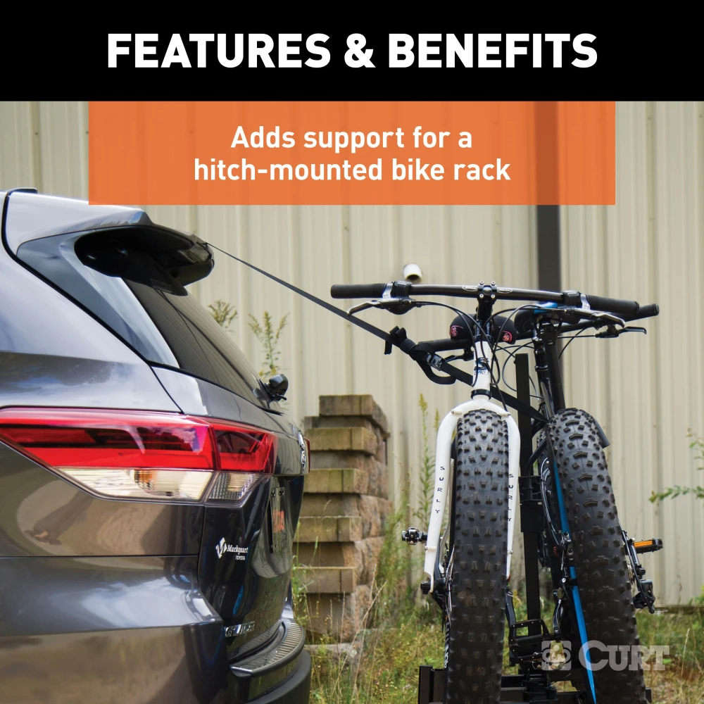 CURT bike rack support strap providing stability for hitch-mounted racks