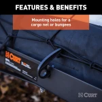 CURT trailer hitch cargo carrier, mesh tray-style, black powder coat, mounted on vehicle.
