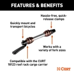 CURT quick-release bike mount attached to a roof rack holding bicycles