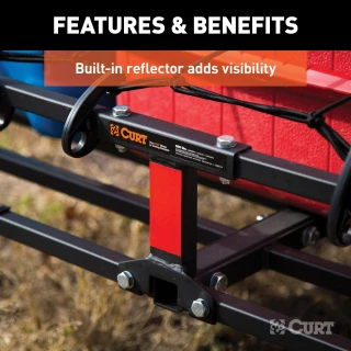 CURT basket cargo carrier with 6-inch tall sides for secure travel, fits most receiver hitches, holds up to 500 lbs.