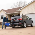 CURT hitch-mounted cargo carrier with 6-inch tall sides and durable mesh base
