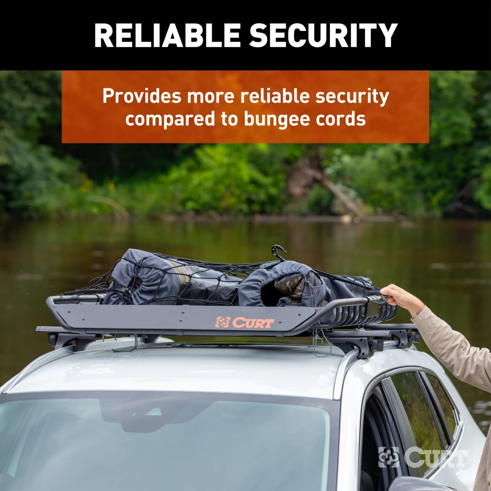 CURT cargo carrier net securely fastened over roof rack with hooks