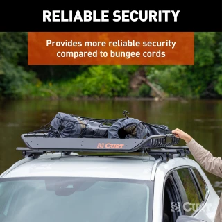 CURT cargo carrier net securely fastened over roof rack with hooks
