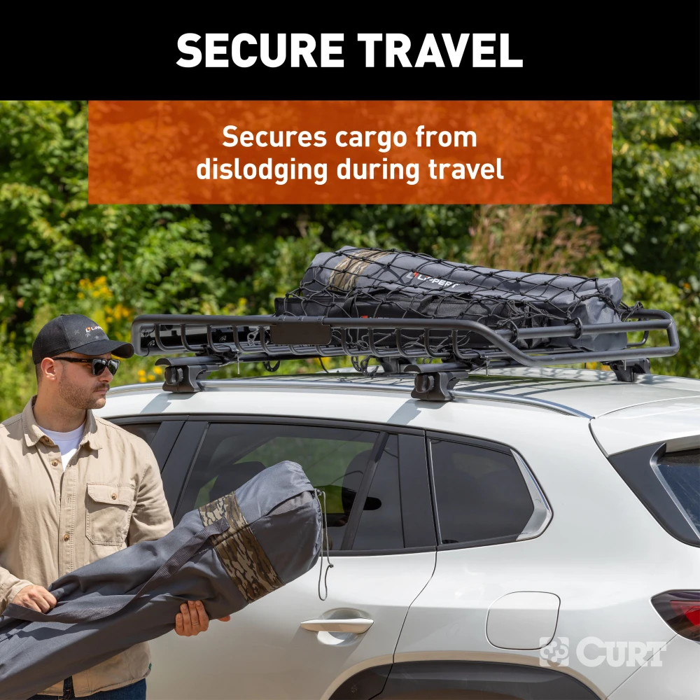 CURT cargo carrier net securely fastened over roof rack with hooks