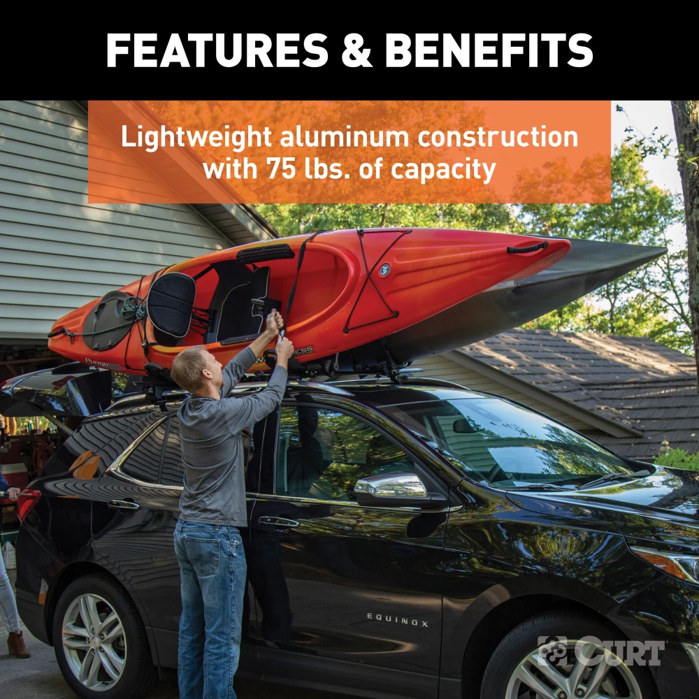 CURT kayak roof rack with adjustable arms and foam padding on vehicle roof