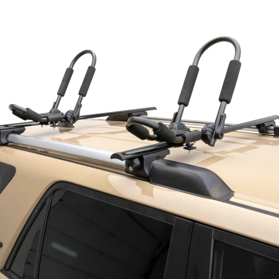 CURT kayak roof rack with adjustable arms and foam padding on vehicle roof