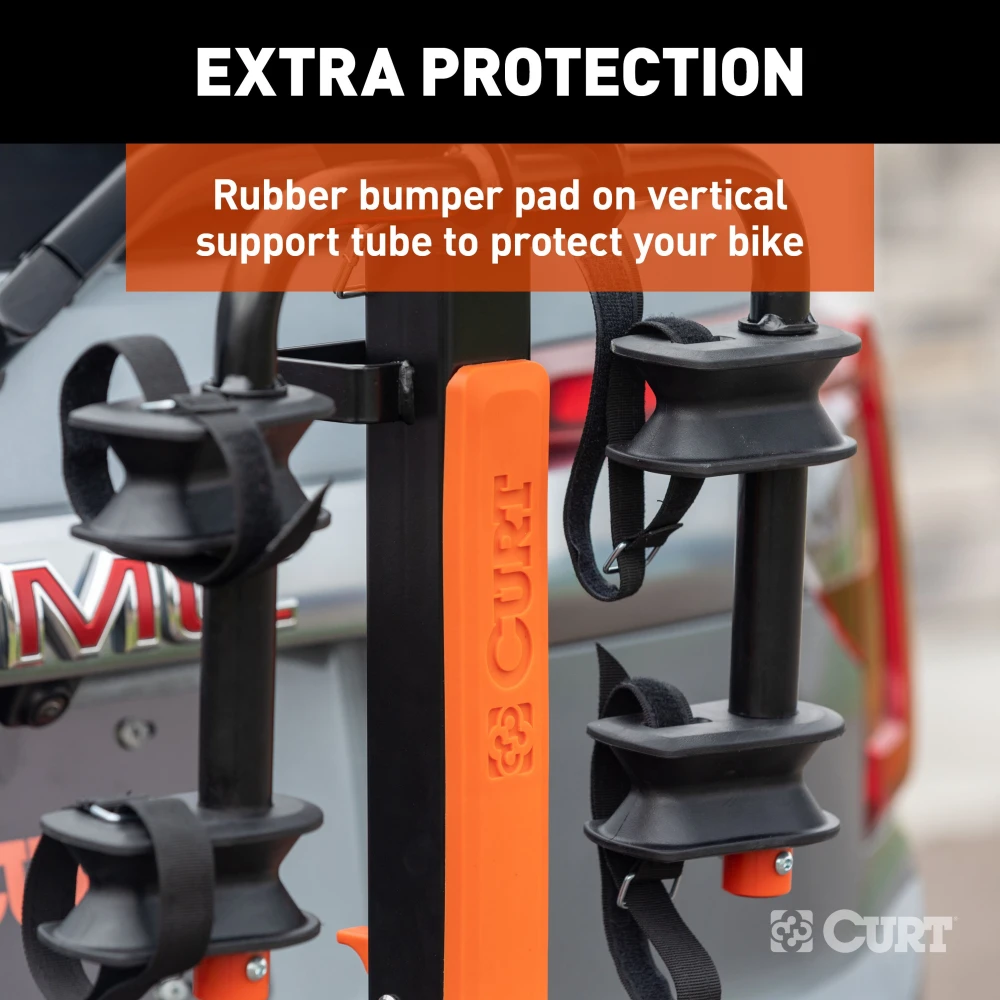 CURT ActiveLink SE bike rack holding two bikes on a vehicle hitch.