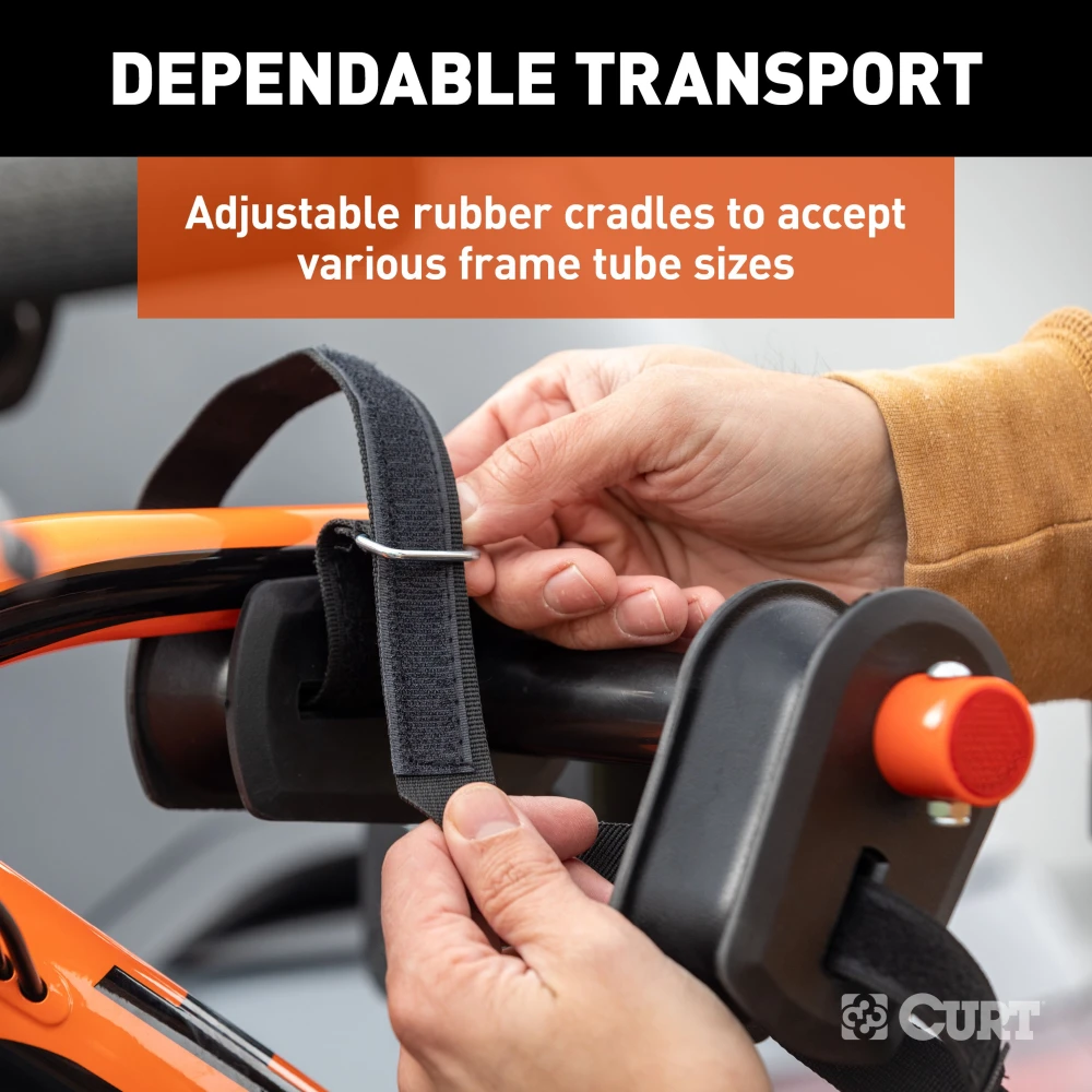 CURT bike rack with ActiveLink hitch system holds 4 bikes securely for safe travel.