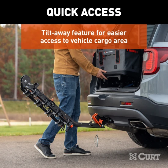 CURT bike rack with ActiveLink hitch system holds 4 bikes securely for safe travel.