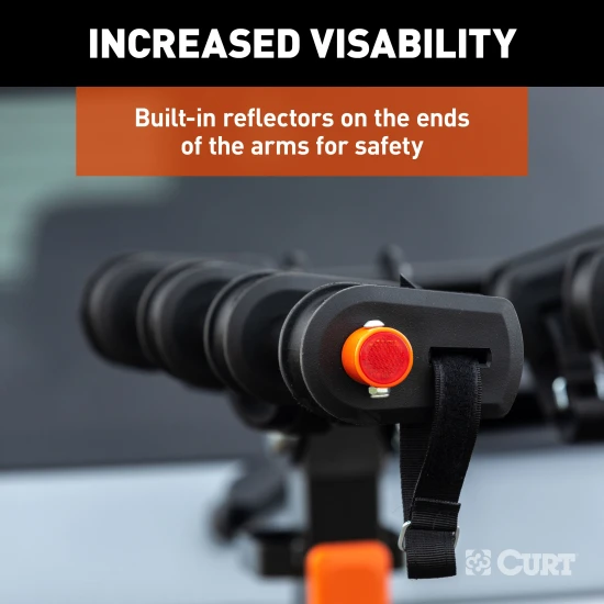 CURT bike rack with ActiveLink hitch system holds 4 bikes securely for safe travel.