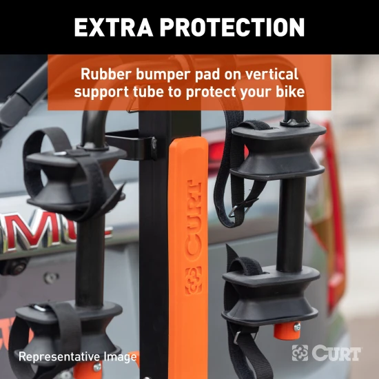CURT bike rack with ActiveLink hitch system holds 4 bikes securely for safe travel.