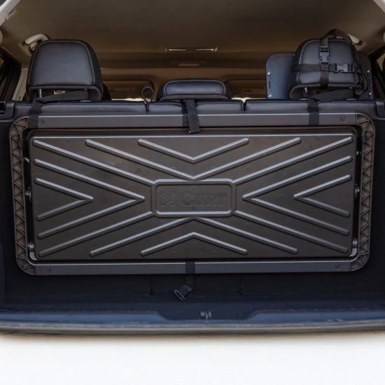 Pakka cargo caddie fits in SUV trunk, adjustable and durable for organized storage.