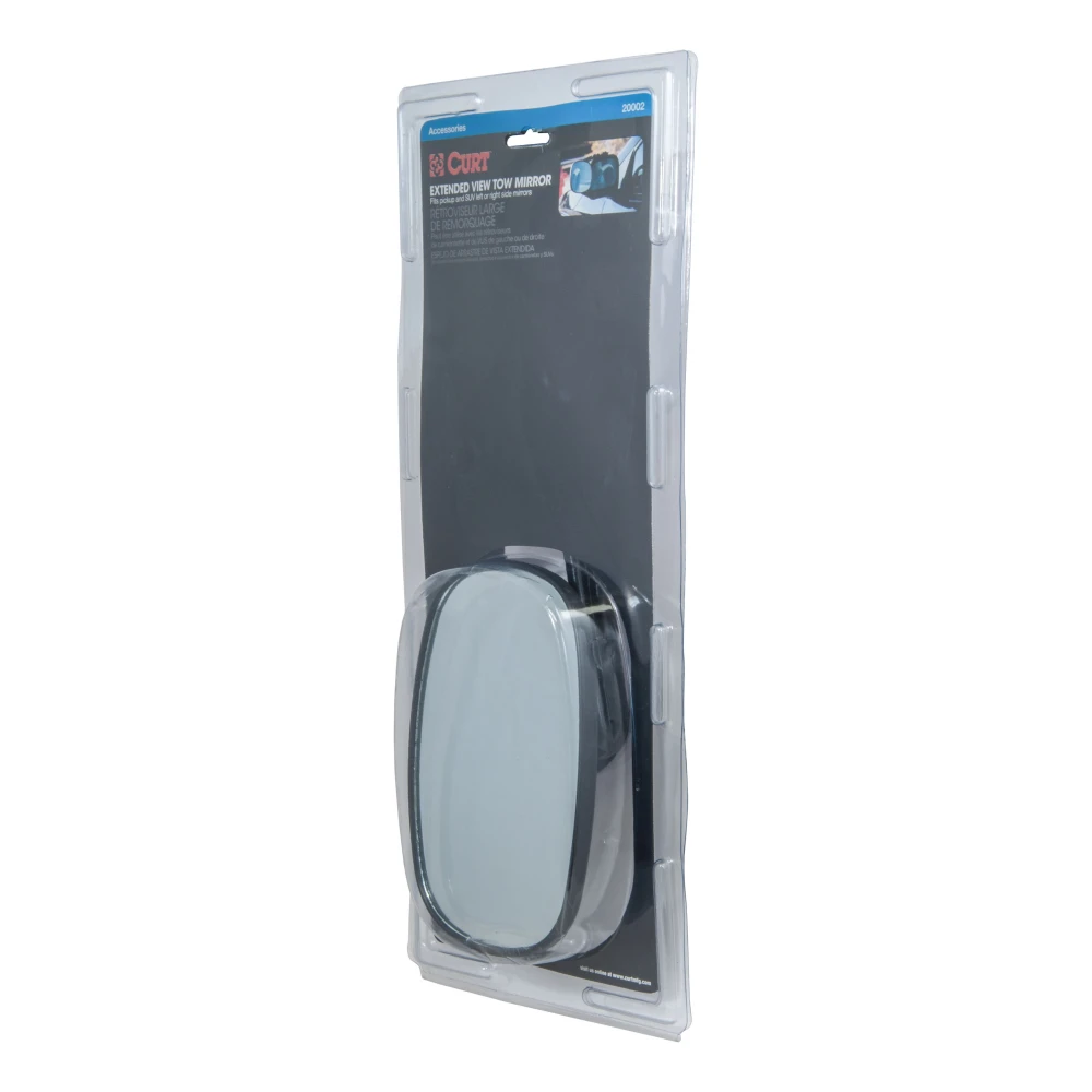 CURT extended view tow mirror attached to a vehicle mirror, enhancing rear visibility while towing.