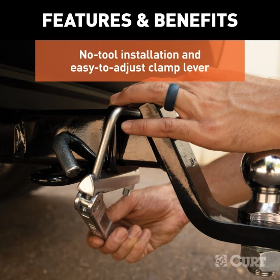 CURT anti-rattle hitch clamp installed on a 2-inch receiver hitch, preventing noise and vibration