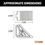 CURT HD wheel chocks with mounting bracket attached to trailer, shown in use.