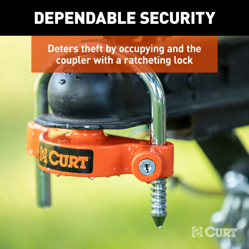 CURT universal trailer coupler lock with bright orange finish, fitting 1-7/8", 2" and 2-5/16" couplers, offering easy and secure installation.