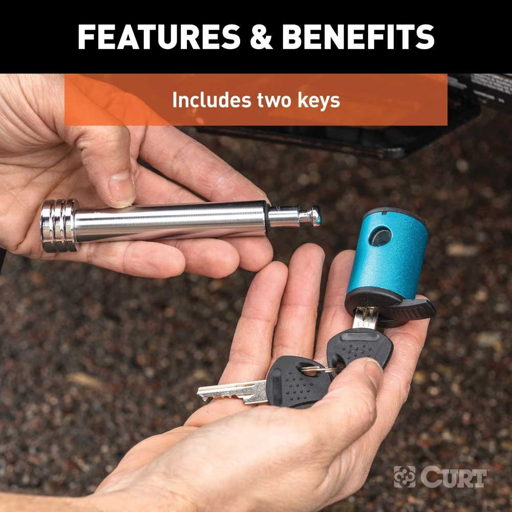 CURT hitch lock with 5/8 inch pin, right angle barbell design for secure trailer attachment