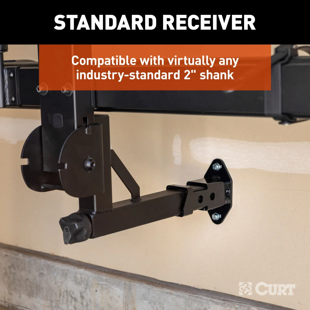 CURT wall mount organizing hitch accessories in a garage