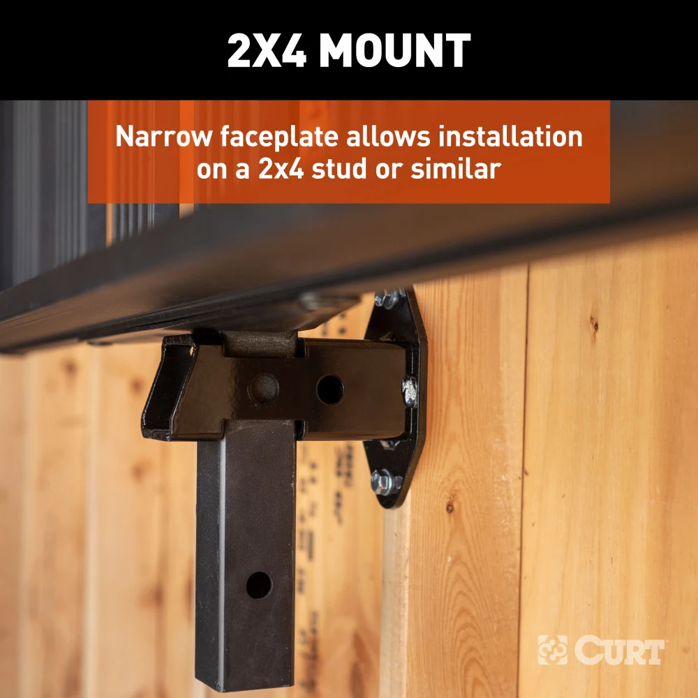 CURT wall mount organizing hitch accessories in a garage