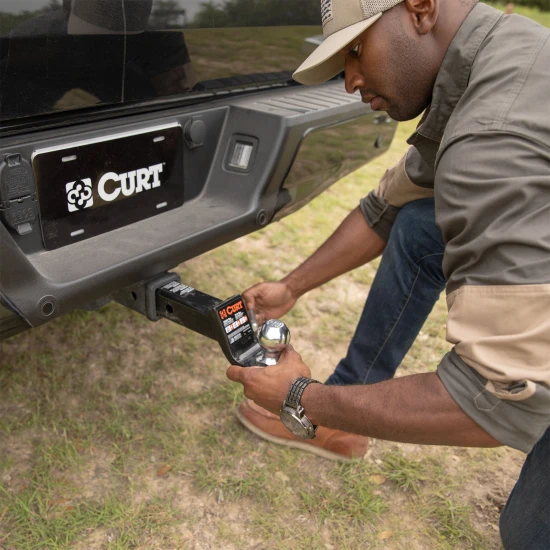 CURT Class 4 ball mount featuring 2" x 2" shank and gloss black powder coat finish.